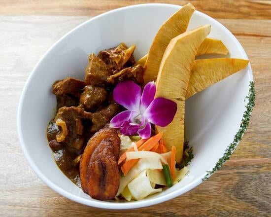 Breadfruit with Curry Goat.