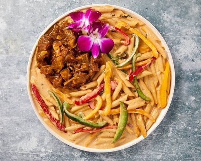 Rasta Pasta with Curry Goat.