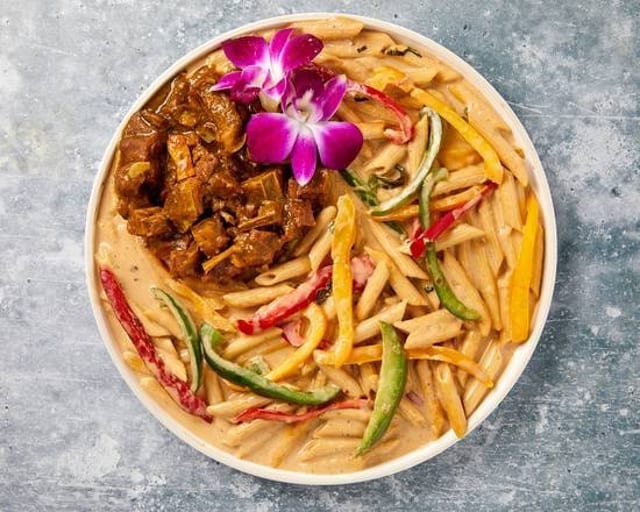 Rasta Pasta with Curry Goat.
