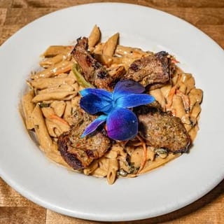 Rasta Pasta with Grilled Lamb Chop