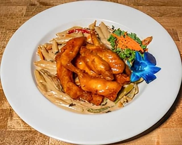 Rasta Pasta with Honey Garlic Chicken Tenders.