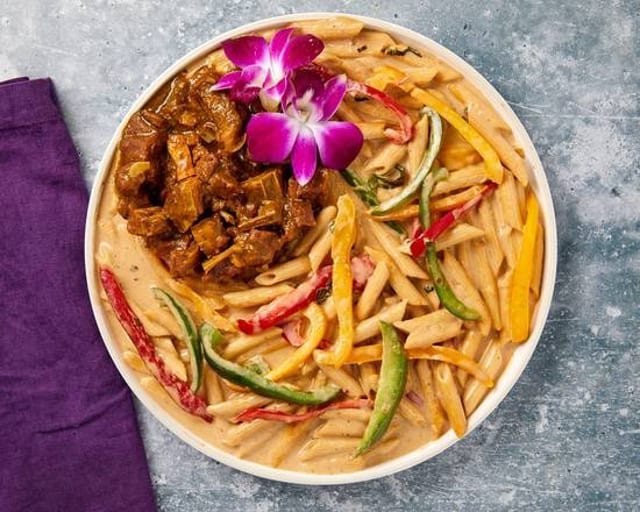 Rasta Pasta with Curry Goat.