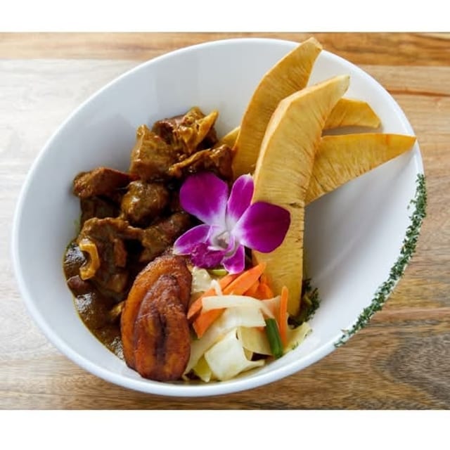 Bammie with Curry Goat.