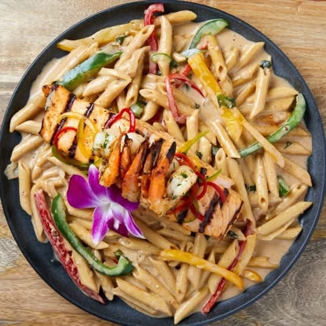 Rasta Pasta w/ Shrimp & Salmon Filet.